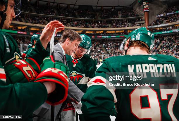 Assistant Coach of the Minnesota Wild Darby Hendrickson addresses the team in the third period of the game against the Winnipeg Jets at Xcel Energy...