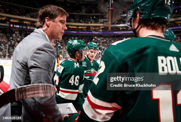 Assistant Coach of the Minnesota Wild Darby Hendrickson addresses the team in the third period of the game against the Winnipeg Jets at Xcel Energy...