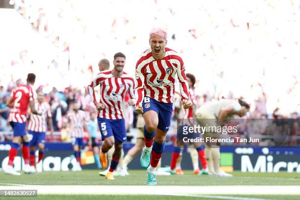 Antoine Griezmann of Atletico Madrid celebrates after scoring the team's first goal during the LaLiga Santander match between Atletico de Madrid and...