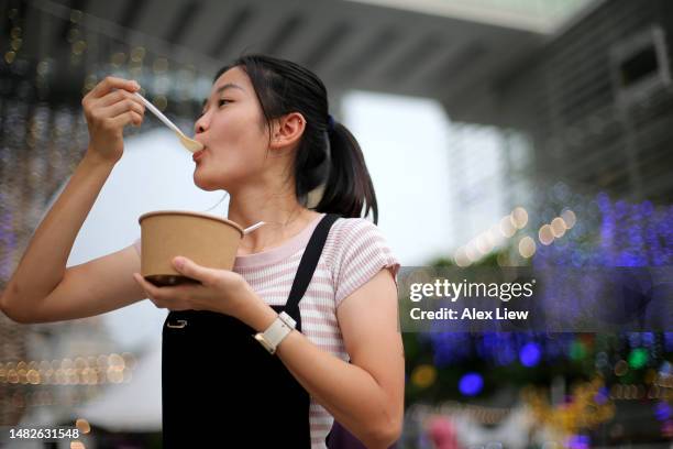 snacking - disposable cup stock pictures, royalty-free photos & images