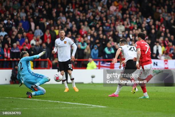 Diogo Dalot of Manchester United scores the team's second goal past Keylor Navas of Nottingham Forest during the Premier League match between...