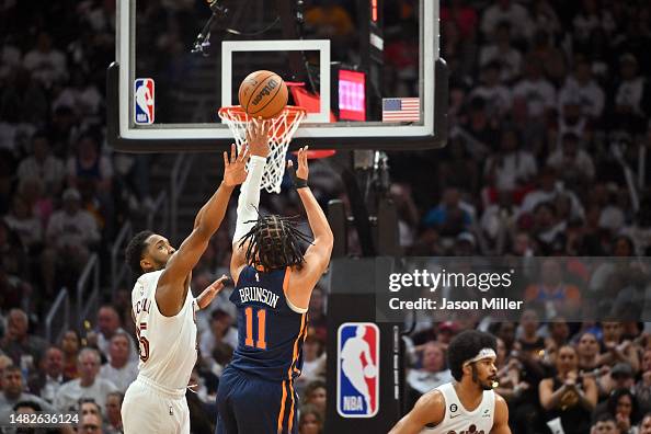 Jalen Brunson of the New York Knicks shoots over Donovan Mitchell of ...