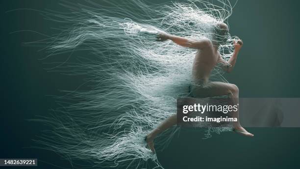 running man with wires - man escaping stock pictures, royalty-free photos & images