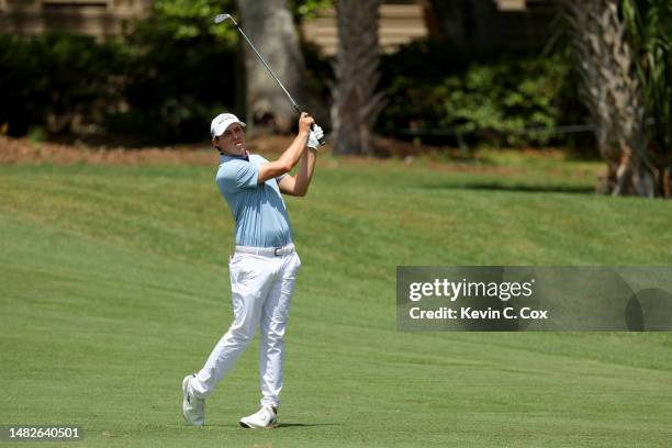 Matt Fitzpatrick of England plays an approach shot on the first hole during the final round of the RBC Heritage at Harbour Town Golf Links on April...