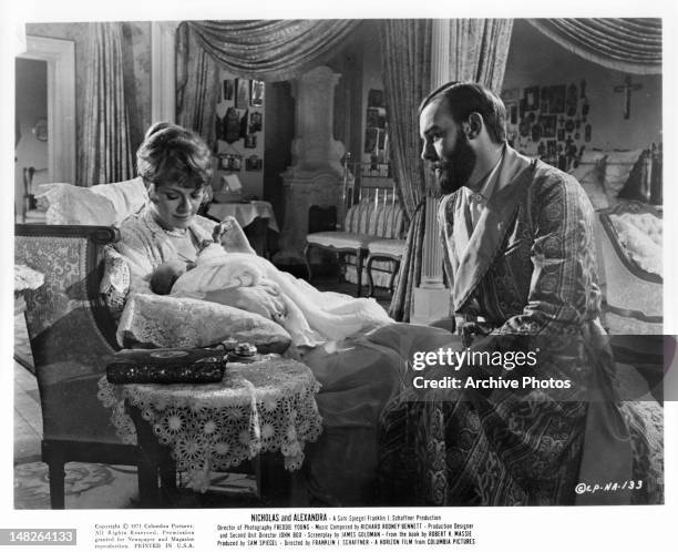 Janet Suzman and Michael Jayston with baby in a scene from the film 'Nicholas And Alexandra', 1971.