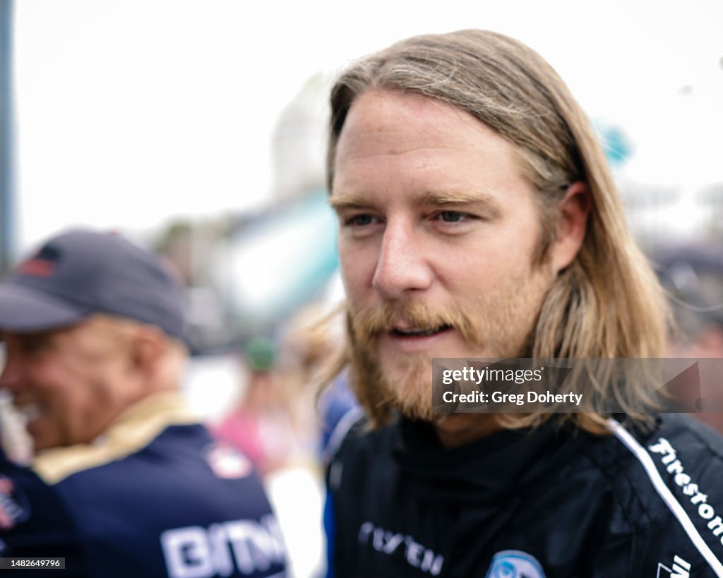 Actor Jake McDorman prepares to do laps at the Indy Car Experience at