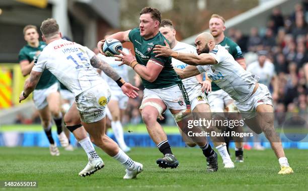 Jasper Wiese of Leicester Tigers breaks away from Olly Woodburn during the Gallagher Premiership Rugby match between Leicester Tigers and Exeter...