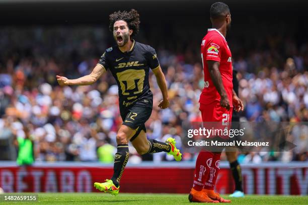 César Huerta of Pumas celebrates after scoring the team's second goal during the 15th round match between Pumas UNAM and Toluca as part of the Torneo...