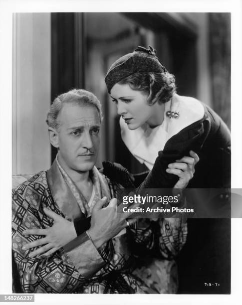 Irene Hervey tries to comfort Otto Kruger in a scene from the film 'The Women In His Life', 1933.