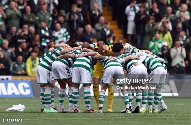 The Celtic team perform a huddle prior to the Cinch Scottish Premiership match between Kilmarnock FC and Celtic FC at on April 15, 2023 in...