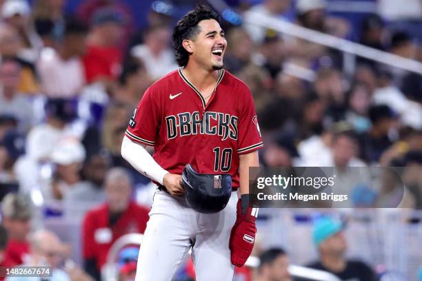 Josh Rojas of the Arizona Diamondbacks reacts on third base during the sixth inning of the game against the Miami Marlins at loanDepot park on April...