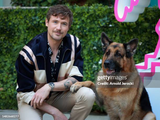 John Reardon and German Shepherd Dog Diesel vom Burgimwald, aka Rex, attends the 6th Canneseries International Festival : Day Three on April 16, 2023...