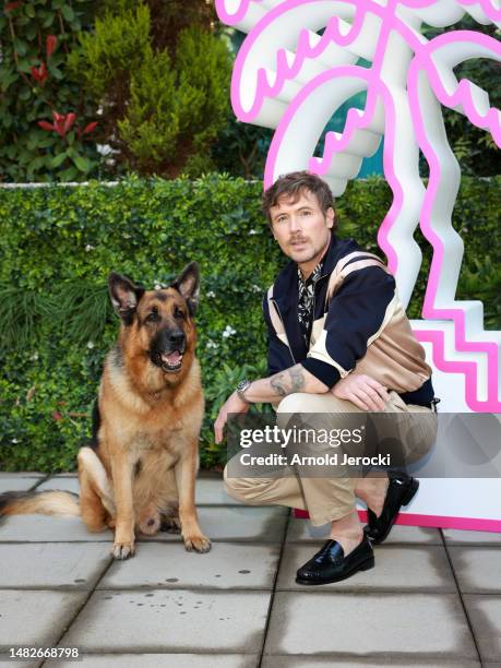 John Reardon and German Shepherd Dog Diesel vom Burgimwald, aka Rex, attends the 6th Canneseries International Festival : Day Three on April 16, 2023...