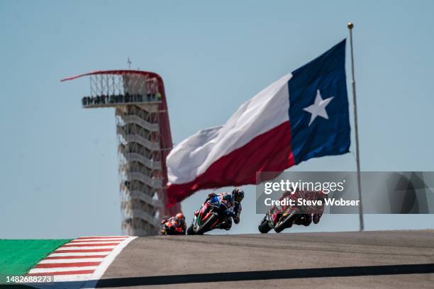 Francesco Bagnaia of Italy and Ducati Lenovo Team leads the race in front of Alex Rins of Spain and LCR Honda Castrol during the Race of the MotoGP...