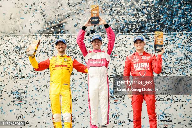 Romain Grosjean , Kyle Kirkwood and Marcus Ericsson celebrate their podium finishes at the 2023 Acura Grand Prix Of Long Beach on April 16, 2023 in...