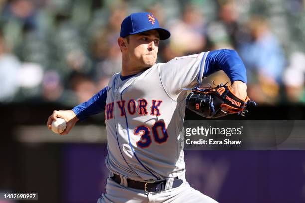 David Robertson of the New York Mets pitches against the Oakland Athletics in the 10th inning at RingCentral Coliseum on April 16, 2023 in Oakland,...