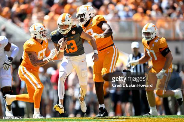 Gaston Moore runs the ball in the first quarter during the Tennessee Volunteers spring football game at Neyland Stadium on April 15, 2023 in...