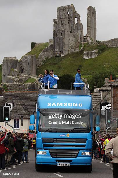 Sponsor vehicle drives as part of the Torch Relay convoy as Corfe Castle stands in the background, during Day 56 of the London 2012 Olympic Torch...