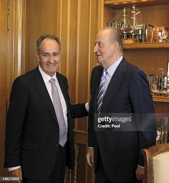 King Juan Carlos of Spain meets the organisers of the Copa del Rey Audi Mapfre chaired by Javier Sanz Fernandez , President of the RCN Palma de...