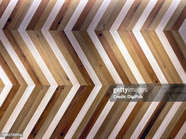 wooden wall with chevrons on it, in the style of dark white and light brown - herringbone stock pictures, royalty-free photos & images