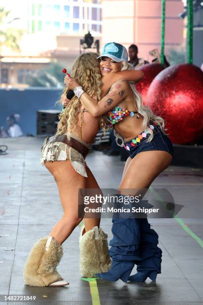 Latto and Saweetie perform at the Sahara Tent during the 2023 Coachella Valley Music and Arts Festival on April 16, 2023 in Indio, California.