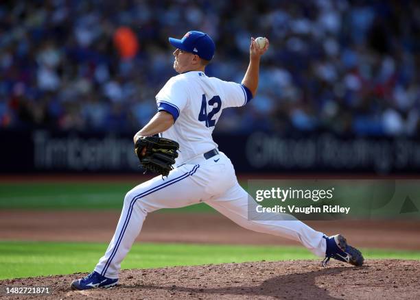 Erik Swanson of the Toronto Blue Jays delivers a pitch during a game against the Tampa Bay Rays at Rogers Centre on April 15, 2023 in Toronto,...