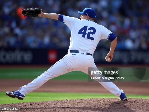 Erik Swanson of the Toronto Blue Jays delivers a pitch during a game against the Tampa Bay Rays at Rogers Centre on April 15, 2023 in Toronto,...