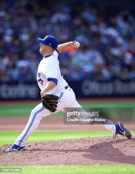 Erik Swanson of the Toronto Blue Jays delivers a pitch during a game against the Tampa Bay Rays at Rogers Centre on April 15, 2023 in Toronto,...