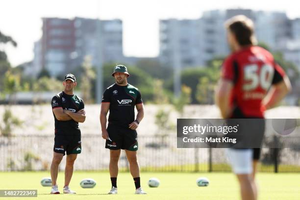 Rabbitohs head coach Jason Demetriou and assistant coach Sam Burgess look on during a South Sydney Rabbitohs NRL Training Session at USANA Rabbitohs...