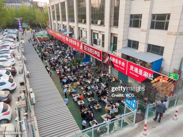 Barbecue restaurant is packed with diners on March 31, 2023 in Zibo, Shandong Province of China.