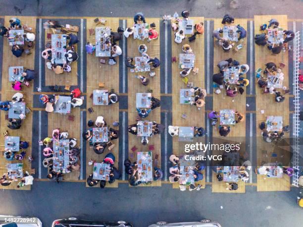 Barbecue restaurant is packed with diners on March 31, 2023 in Zibo, Shandong Province of China.