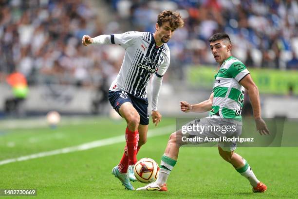 Jordi Cortizo of Monterrey fights for the ball with Juan Brunetta of Santos during the 15th round match between Monterrey and Santos Laguna as part...