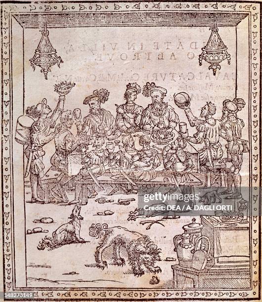 Court banquet in Ferrara by Cristoforo de Messisburgo , engraving from Banchetti, Composizioni di Vivande et Apparecchio Generale . ; Ferrara,...