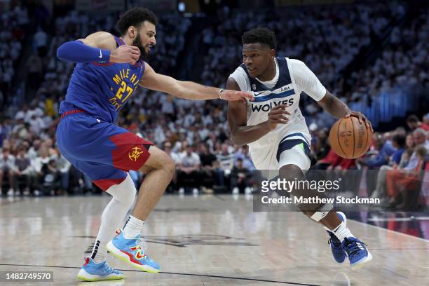 Anthony Edwards of the Minnesota Timberwolves drives against Jamal Murray of the Denver Nuggets in the first quarter during Round 1 Game 1 of the NBA...