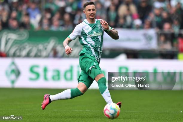 Marco Friedl of SV Werder Bremen runs with the ball during the Bundesliga match between SV Werder Bremen and Sport-Club Freiburg at Wohninvest...