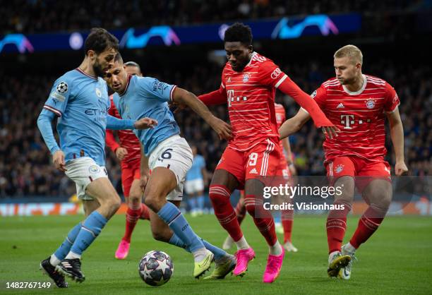 Bernardo Silva and Rodrigo of Manchester City in action with Alphonso Davies and Matthijs de Ligt of Bayern Munich during the UEFA Champions League...