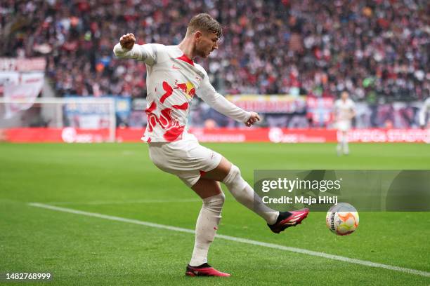 Timo Werner of RB Leipzig controls the ball during the Bundesliga match between RB Leipzig and FC Augsburg at Red Bull Arena on April 15, 2023 in...