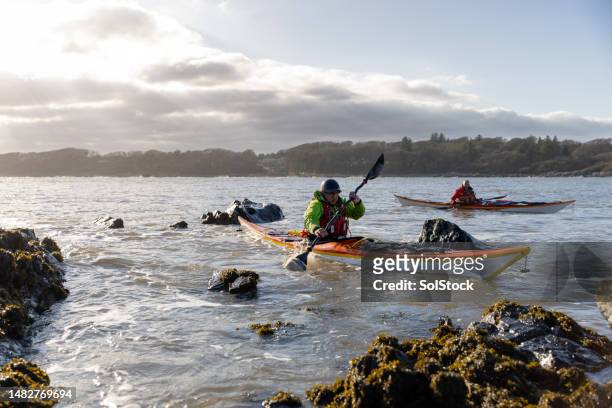 kayaking with a view - outdoor activity stock pictures, royalty-free photos & images