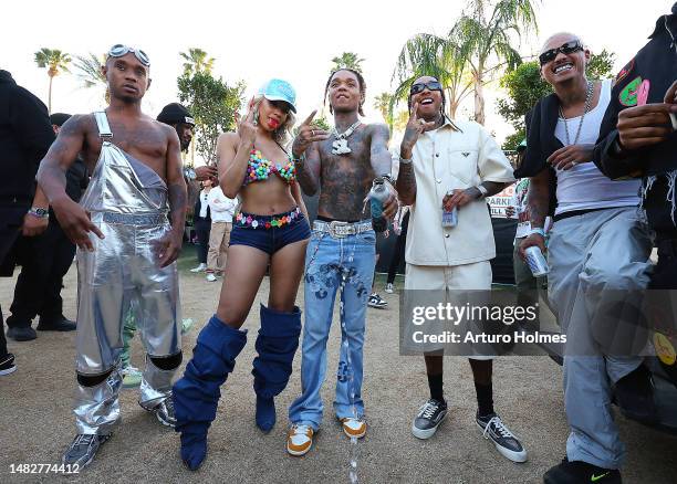 Slim Jxmmi of Rae Sremmurd, Saweetie, Swae Lee of Rae Sremmurd, Tyga, and Alexander “A.E.” Edwards pose backstage during the 2023 Coachella Valley...