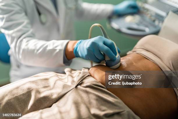 ultrasound scanning of intestines, abdominal cavity, right lobe, liver, bile ducts, gallbladder - gynecology stock pictures, royalty-free photos & images