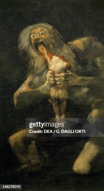 Saturn devouring his children, 1821-1823, by Francisco de Goya , mural painting taken from Quinta del Sordo house, 146x83 cm. ; Madrid, Museo Del...