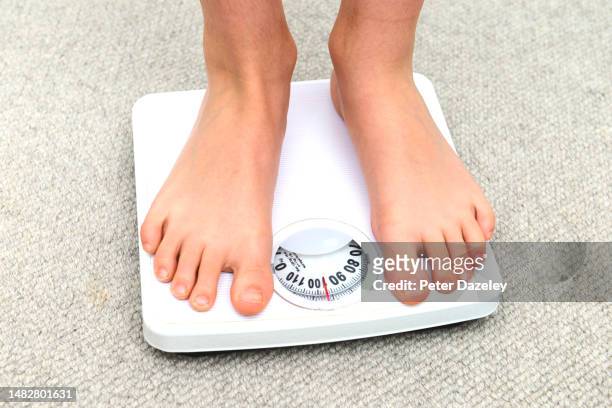 overweight 11 year old schoolboy - childhood obesity stock pictures, royalty-free photos & images