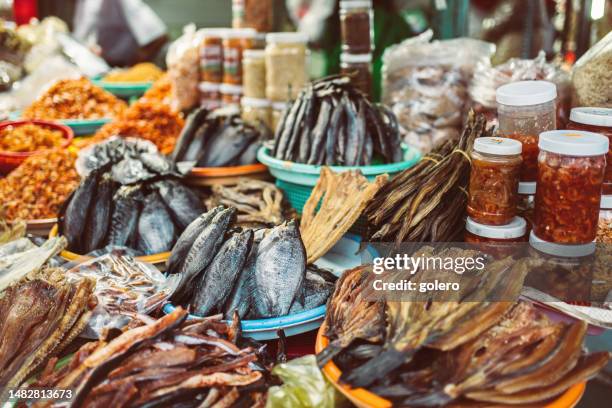 dried fish at street market in mekong delta, vietnam - dried fish stock pictures, royalty-free photos & images