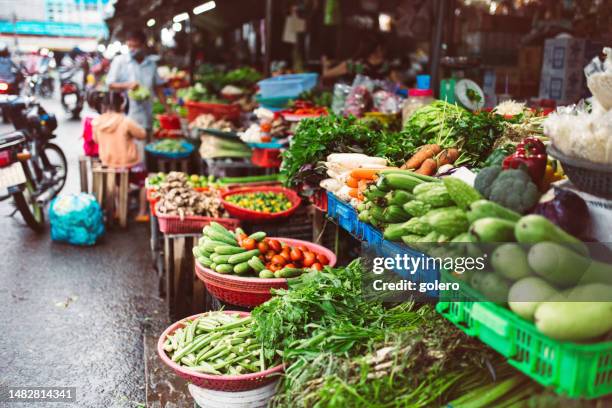 fresh vegetables at farmers market in vietnam - vietnam market stock pictures, royalty-free photos & images