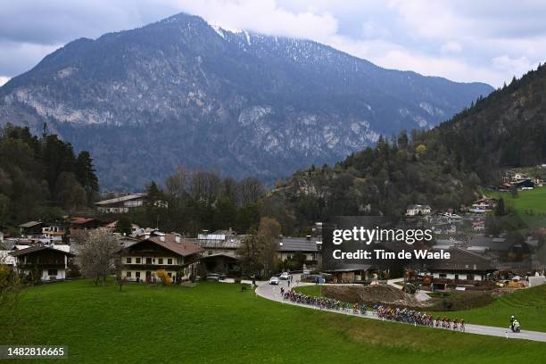 General view of the peloton passing through a Brixlegg village with mountainous landscape during the 46th Tour of the Alps 2023, Stage 1 a 127.5km...