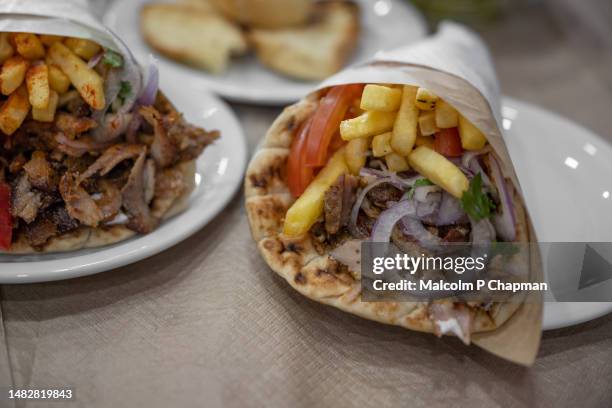 pork gyros, kebab, in pitta bread, mytilene, lesvos, greece - greek food stock pictures, royalty-free photos & images