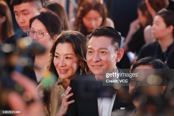 Actress Michelle Yeoh and actor Andy Lau Tak-wah arrive at the red carpet for the 41st Hong Kong Film Awards at Hong Kong Cultural Centre on April...