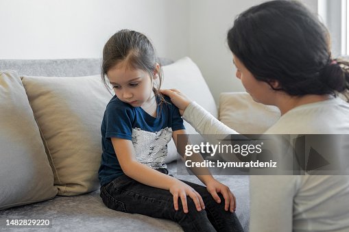 Mother is feeling sorry for a crying child