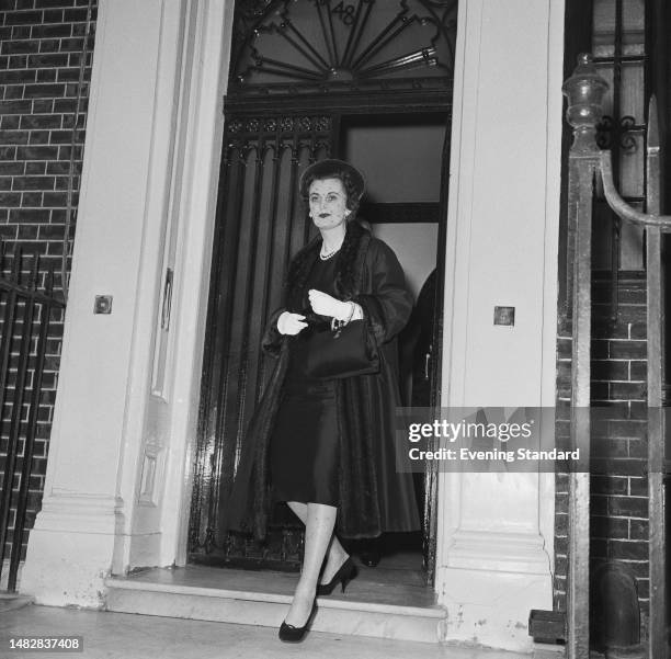 Margaret Campbell, the Duchess of Argyll leaving her house at 48 Upper Grosvenor Street, Mayfair, London, December 23rd 1959.