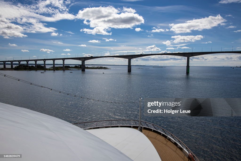 Bow of expedition cruise ship World Voyager (nicko cruises) approaching Ölandsbron bridge connecting Kalmar and Öland island